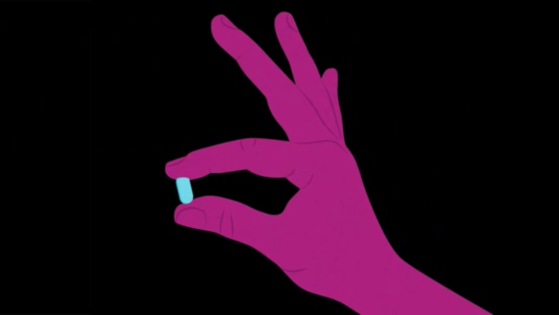 A fuchsia hand in the middle of the image holds out to the left a light blue pill against a black background.